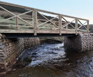 Concrete filled bagwork helps create bridge access route to woodland