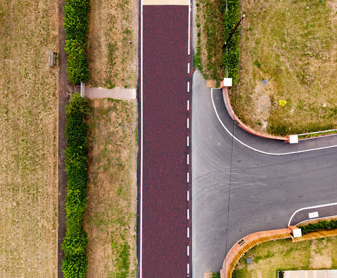 NatraTex ChipTex - coloured demarcation aggregate for tarmac