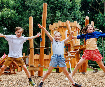 Medieval themed timber play sculpture for historic Warwick Castle