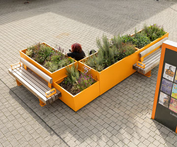Planters and seating extend Cornerstone Arts Centre outdoors