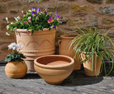 Eri - small terracotta bowl with light ribbing detail for bulbs - on this page
