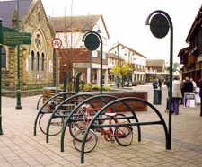 Type 185 Steel cycle stand with logo post - curved semi circular bike stand