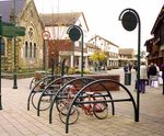 Type 185 Steel cycle stand with logo post - curved semi circular bike stand