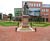 Terracotta surfacing creates vibrant pathways in park 0