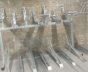 Two tier bike rack with lift assist