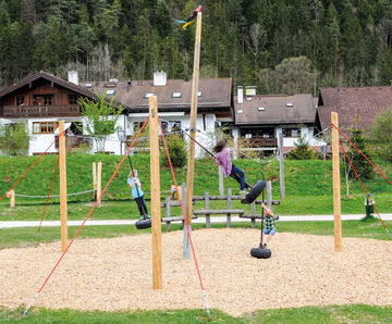 Queen Swing With Flags - outdoor rope swing with tyre seats for parks