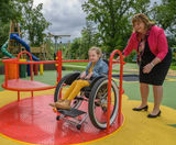 Swirl Inclusive Roundabout - wheelchair accessible playground spinner steel - on this page