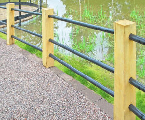 Horizontal timber post and steel rail fencing systems