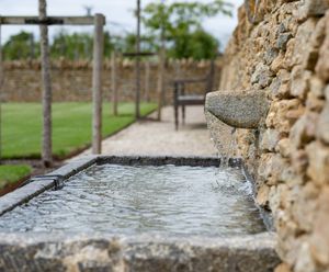 Sculptural water features and advanced irrigation for Emily Estates