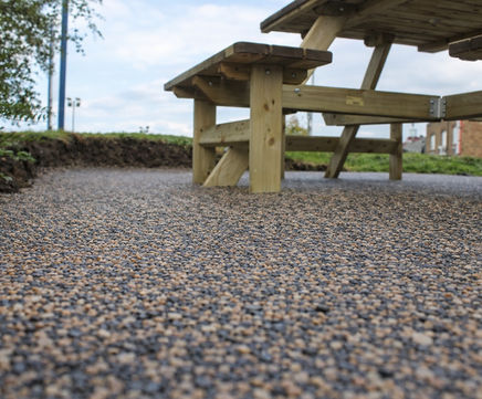 Addaflex-R - recycled rubber and aggregate resin bound porous surfacing