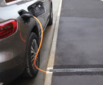 EV Power Channel - recycled cable cover for pavement EV charging safety