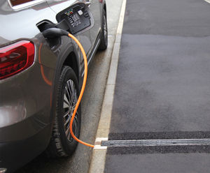 EV Power Channel - recycled cable cover for pavement EV charging safety