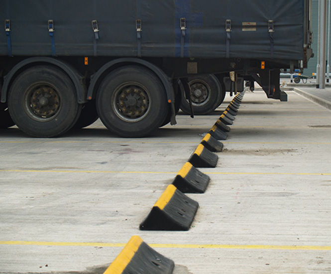 TruckStop wheel stop - recycled rubber truck parking blocks in 2 sizes