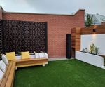 Geometric laser-cut garden screens for modern garden