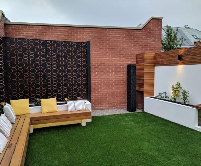Geometric laser-cut garden screens for modern garden