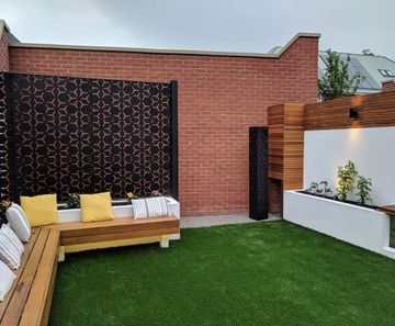 Geometric laser-cut garden screens for modern garden