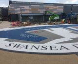 Resin bound wayfinding graphic with historical message - on this page