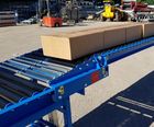 Telescopic gravity roller conveyor