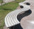 Sinu curved hardwood / stainless steel external seating 2