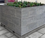 Granite-clad tree planter with forklift slots