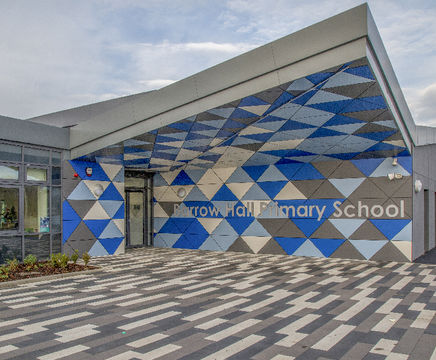Vibrant, energy-efficient rainscreen cladding for school