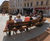 Curved seating with integrated planters for public space 0