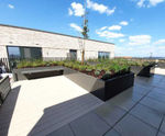 Sustainable raised planter beds for residential rooftop 