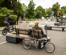 Seating and planters provide accessible seating space 