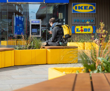 Colourful seating and planters transform public realm