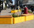 Colourful seating and planters transform public realm 1