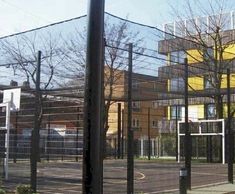 Security fence and bespoke roof for community centre