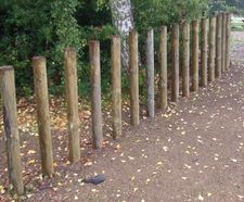 Jakure® treated timber bollards - square/machine rounded
