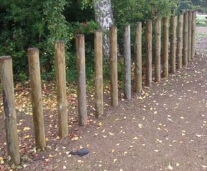 Jakure® treated timber bollards - square/machine rounded
