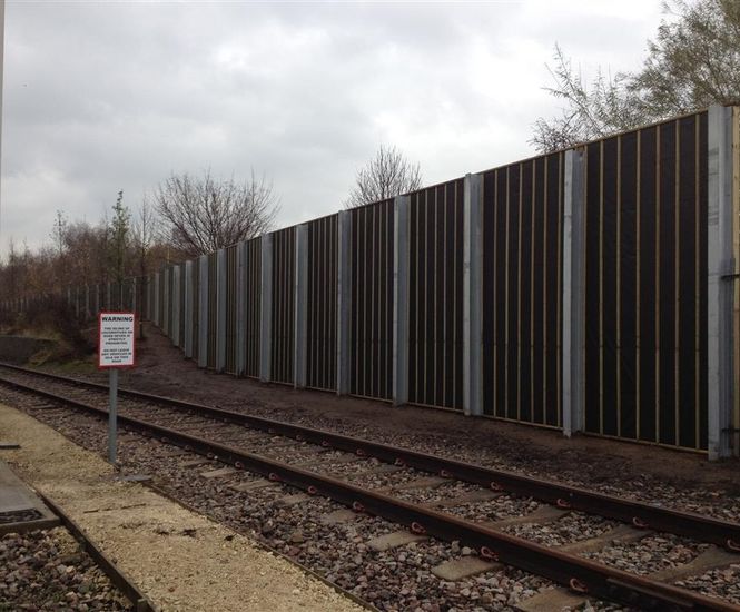 Absorptive barrier reduces rail noise for residents