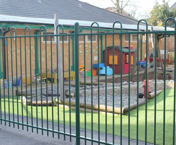 Anti-trap bow top fencing secures school perimeter