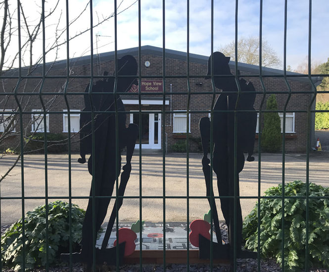 Perimeter fencing and gates protect independent school