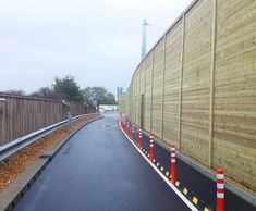 Absorptive acoustic fencing for train maintenance depot