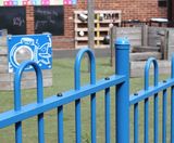 Anti-trap bow-top fencing secures playground environment - on this page