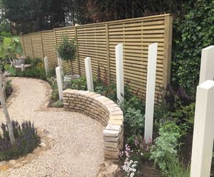 Designer slatted fencing in ITV Love Your Garden project
