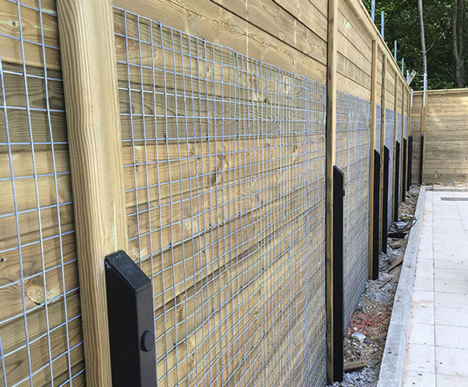Acoustic fencing for dog training facility at airport