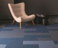 Broadrib fibre-bonded contract carpet tiles