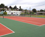 Synthetic tennis court surface installation
