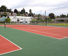 Synthetic tennis court surface installation