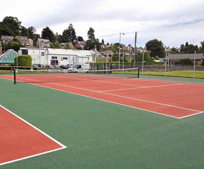 Synthetic tennis court surface installation