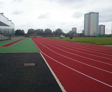 Synthetic athletics track installation