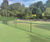 Synthetic tennis court surface installation 3