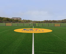 Artificial grass sports surfacing for community facility