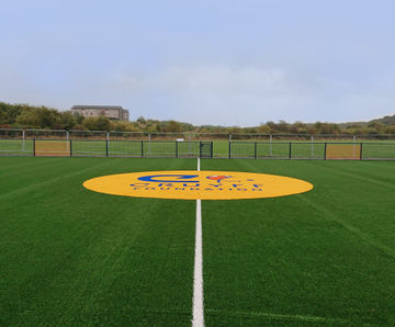 Artificial grass sports surfacing for community facility