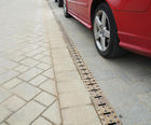 Marshalls Traffic Drain - concrete road drainage channel with iron grates