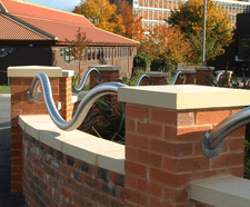 Retrofit of bespoke eccentric stainless steel rails